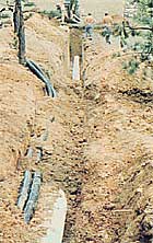 The drainage lines for the foundation run through the same trenches as the "cool tubes".